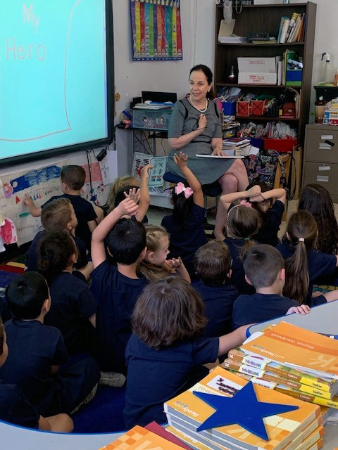 Susan Raisch reading to children and speaking to adults and children about bullying prevention.